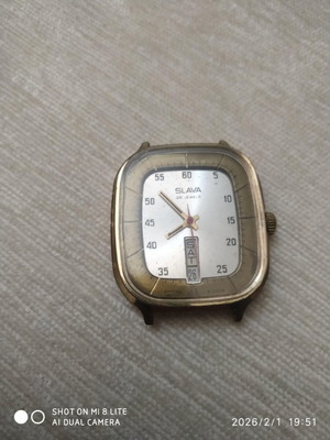 Slava mechanical wristwatch used, beige and gold, collectible from USSR