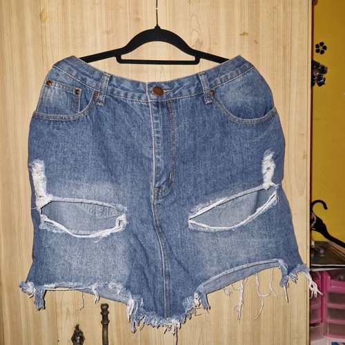Pretty Little Thing blue denim skirt used, short with rips size 44