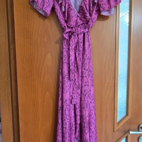 Wrap dress in bright fuchsia with ruffle sleeves