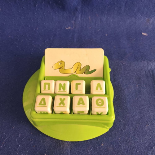 Educational game used for first words and syllables with alphabet cubes