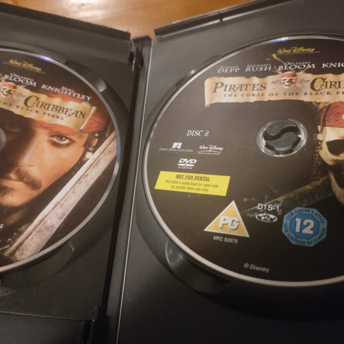 Pirates of the Caribbean DVD set like new, comedy action fantasy