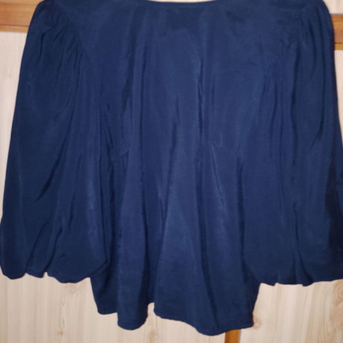 Elegant blouse with bow on back, new