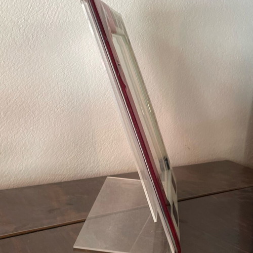 Glass photo frame colored with plexiglass used