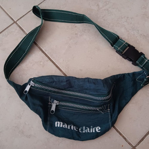Waist bag used in dark green color