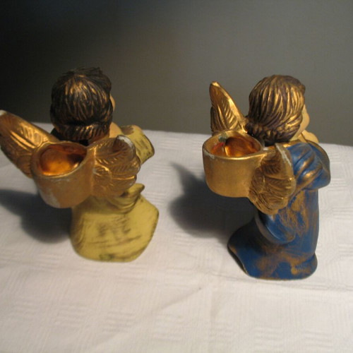 Pair of old clay angels like new