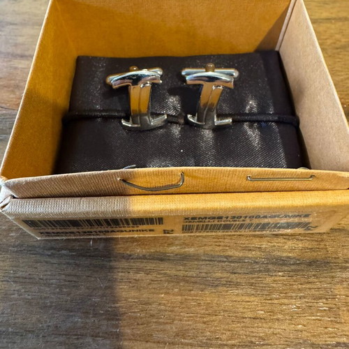 Tods cufflinks like new, silver color