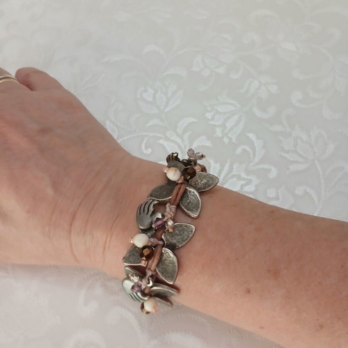 Russa handmade bracelet like new with floral and duck design