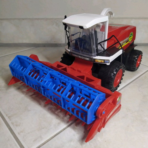 Harvester toy used with trailer