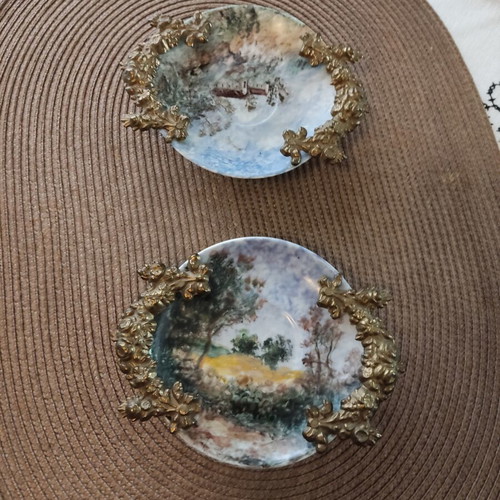 Andreas Zymatikas handpainted porcelain decorative plates, pair