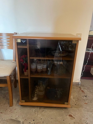 Wooden showcase used with glass doors