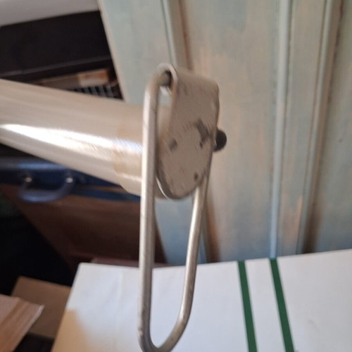 Manual air pump used with wooden handle and flexible hose
