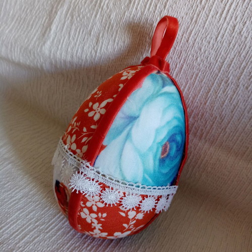 Decorative egg orange and blue floral used