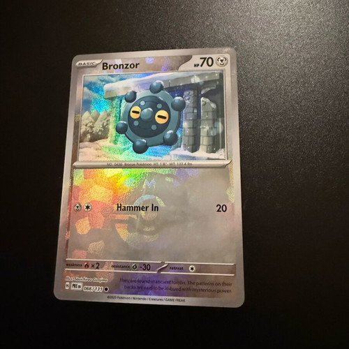 Bronzor Master Ball 066/131 new Prismatic Evolution