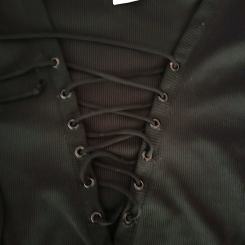 Black blouse used with lace-up neckline, elastic