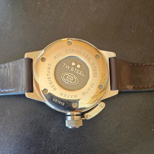 TW Steel watch used with brown strap and date display