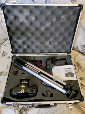 Canomatic camera used with lens, flash, and tripod