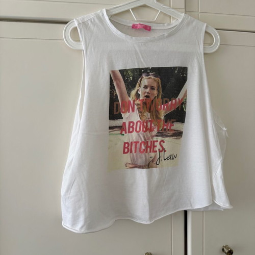 Pink Woman sleeveless white blouse medium like new with front design