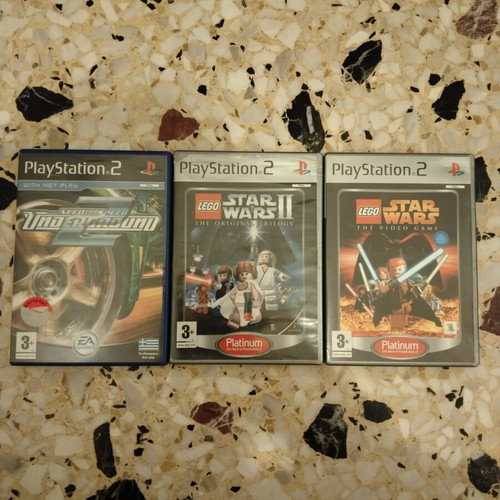 PlayStation 2 cases like new, without CDs, with covers