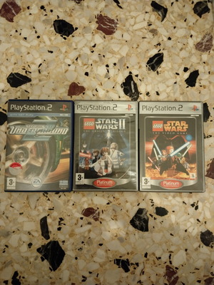 PlayStation 2 cases like new, without CDs, with covers