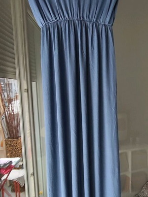 Dress one size new, fits up to slim L