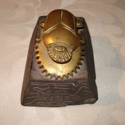 Egyptian bronze decorative scarab used with black hieroglyph base