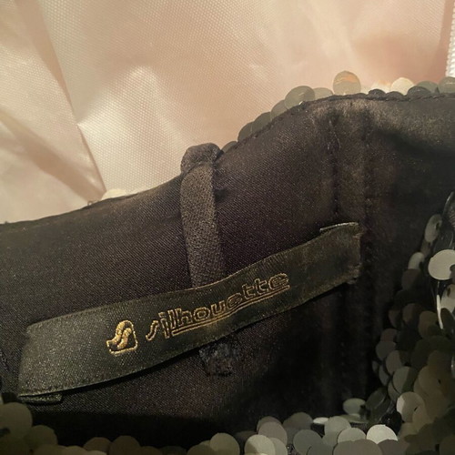Collectible dress new, black and gray with beads and feathers
