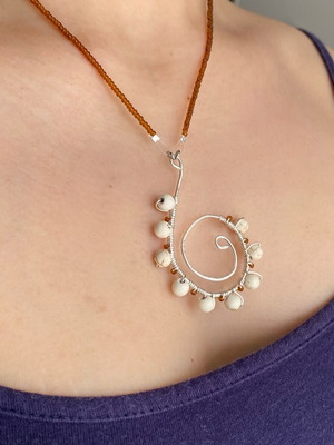 Handmade boho necklace made to order with beads and silver-plated wire charm