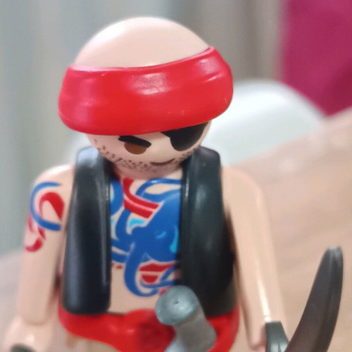 Playmobil Bald Pirate like new with weapon and sword