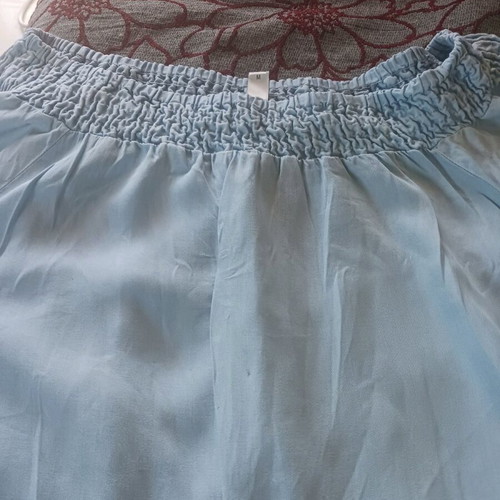 Turquoise women's blouse with elastic top used, size Medium