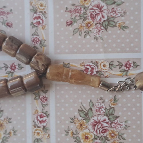Traditional komboloi with 17 horn beads, brown shades