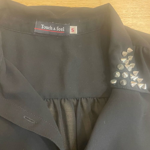 Black sleeveless shirt with studs like new