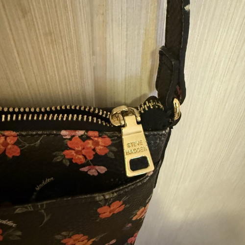 Steve Madden crossbody bag with colorful floral design, black
