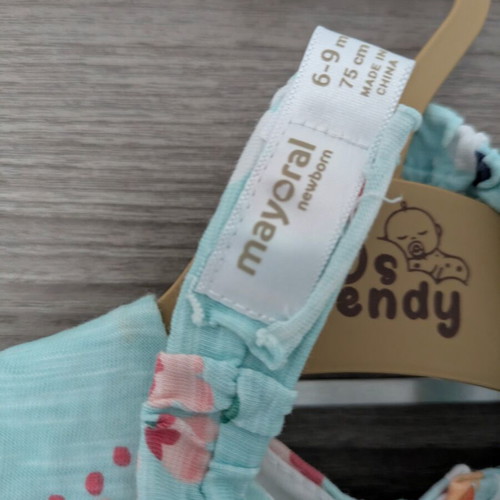 Baby dress with ribbon like new, mint color with floral print