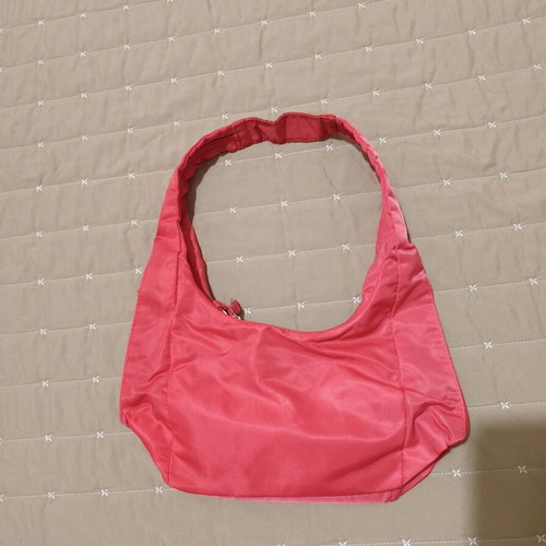 Nylon handbag like new, pink fluo with 3 compartments