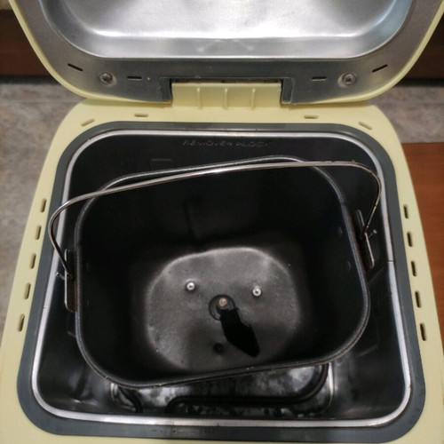 Bread maker used yellow with repaired bowl