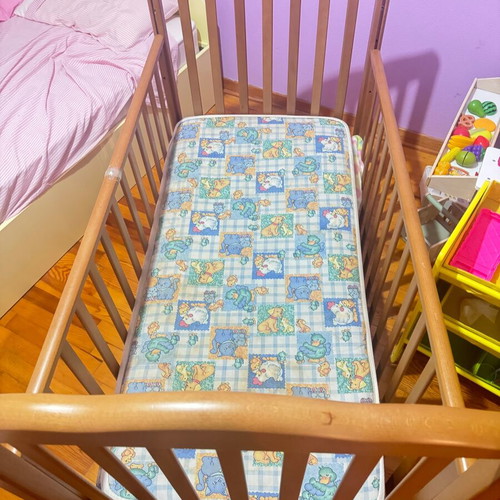 Baby cot used with mattress from coconut fiber
