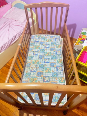 Baby cot used with mattress from coconut fiber