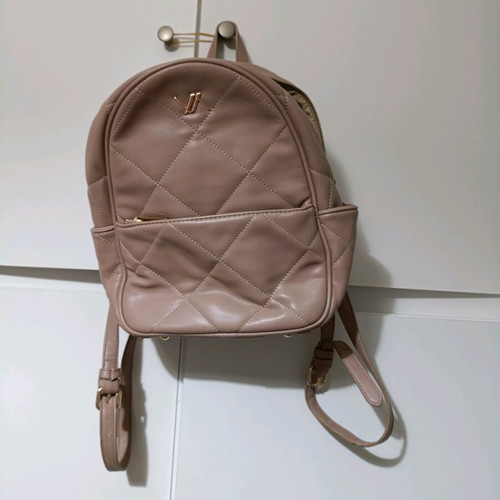 Verde backpack like new, color rotten apple