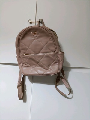 Verde backpack like new, color rotten apple