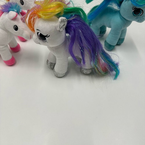 My Little Pony plush toys like new, set of 4 colorful ponies