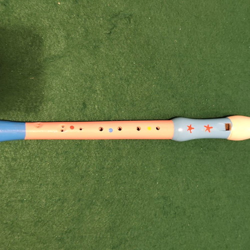Children's wooden recorder with colorful designs