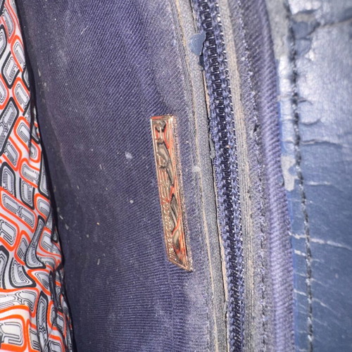 Robert Cavalli bag used with leather damage inside locker