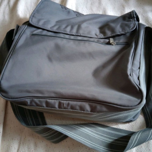Lassig changing bag used, messenger with strap and spacious compartments