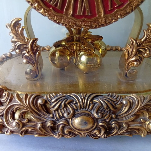 400-day mechanical clock with glass dome