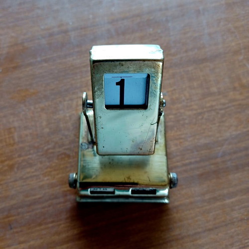 Vintage perpetual flip calendar used, desktop rolodex with French day and month dial