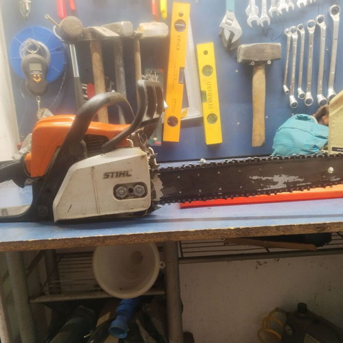Stihl MS180 chainsaw with two new chains, home use