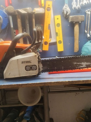 Stihl MS180 chainsaw with two new chains, home use
