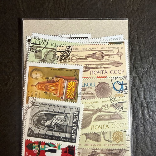Music-themed stamp pack new, 50 different stamps