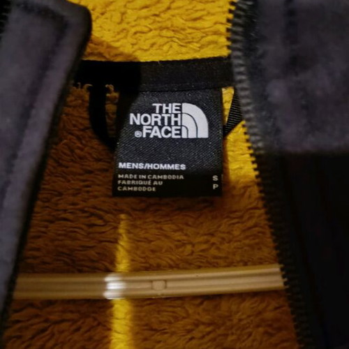 The North Face jacket used, size S, black and yellow