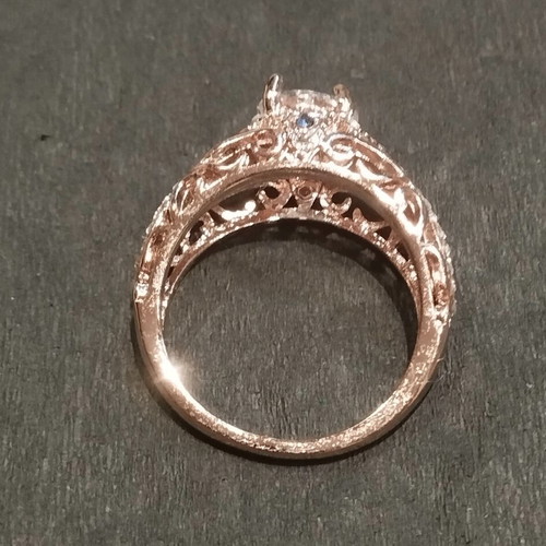 Elegance rose gold ring with white and blue stones